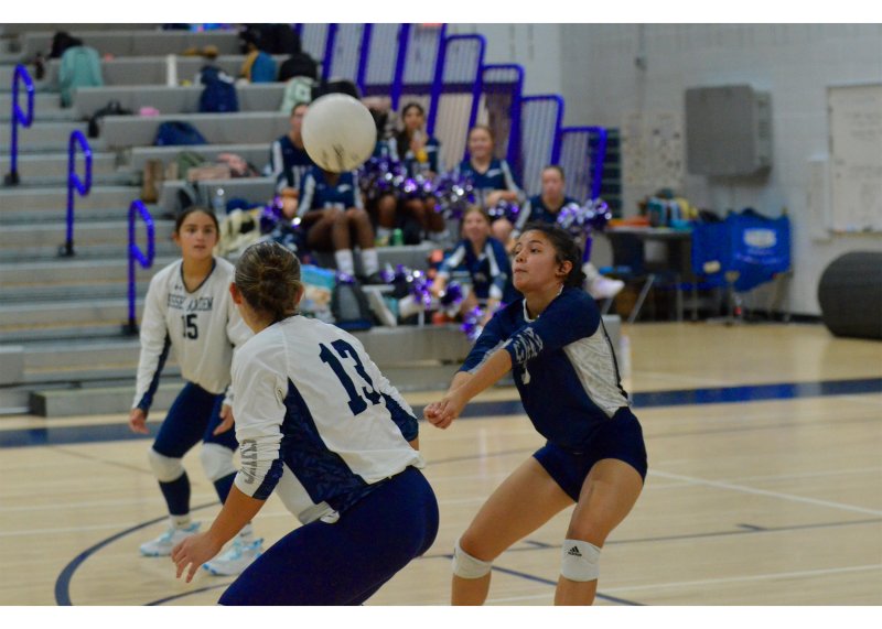 Sussex Academy libero Anna Lara-Nieto bumps the ball as Patti Lara Nieto, left, and Grayce Glover look on during the Seahawks' 3-0 win over Milford Sept. 18. AARON R. MUSHRUSH PHOTOS